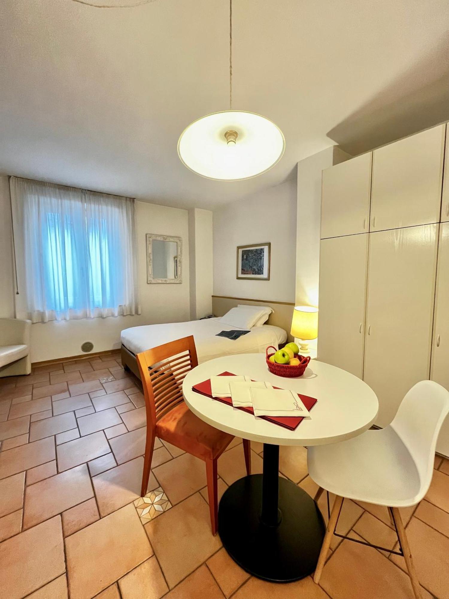 Manci Apartments By Hotel America Trento Bagian luar foto