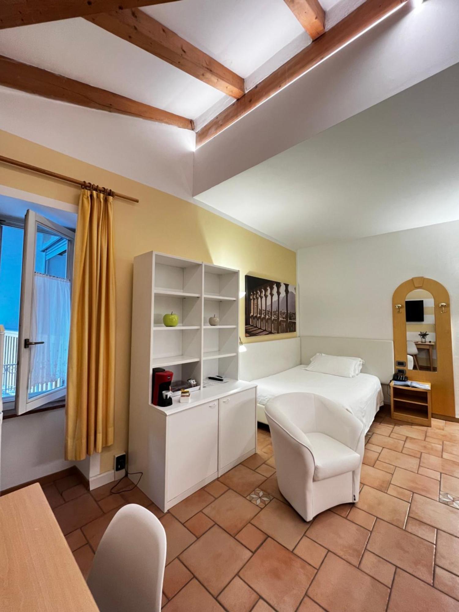 Manci Apartments By Hotel America Trento Bagian luar foto